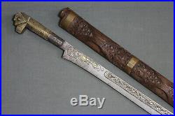 A fine long Berber (Algerian) flissa sword (yatagan shape) Algeria 19th cent