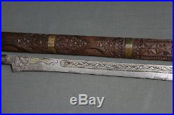 A fine long Berber (Algerian) flissa sword (yatagan shape) Algeria 19th cent