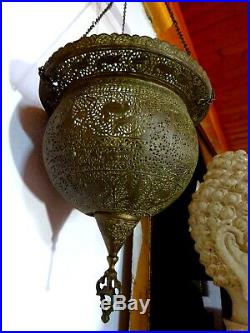 An Antique Middle Eastern Hanging Brass Mosque Lamp