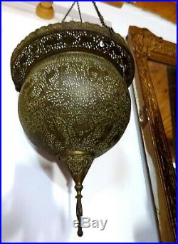 An Antique Middle Eastern Hanging Brass Mosque Lamp