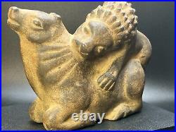 Ancient Carved Stone Figurine depicting a Lion Hunting an Animal