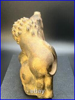 Ancient Carved Stone Figurine depicting a Lion Hunting an Animal