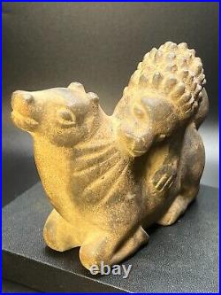 Ancient Carved Stone Figurine depicting a Lion Hunting an Animal