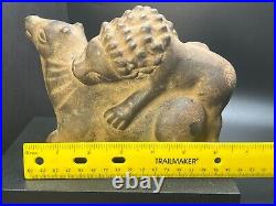 Ancient Carved Stone Figurine depicting a Lion Hunting an Animal