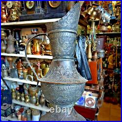 Antique Middle Eastern Copper Water Pitcher with Engraved Floral Design