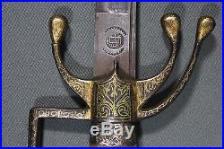 Antique Moroccan nimcha (saif) sword with gold damascened steel guard