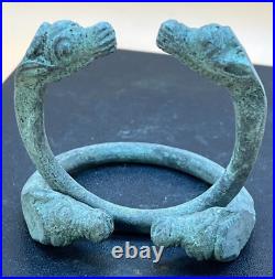 Antique Near Eastern Bronze Bangles with Animal Head Design (Pair)