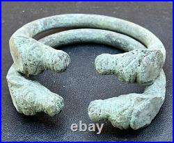 Antique Near Eastern Bronze Bangles with Animal Head Design (Pair)