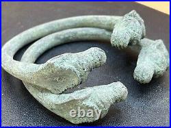 Antique Near Eastern Bronze Bangles with Animal Head Design (Pair)