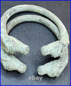 Antique Near Eastern Bronze Bangles with Animal Head Design (Pair)