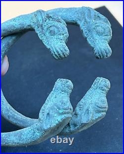 Antique Near Eastern Bronze Bangles with Animal Head Design (Pair)