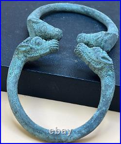 Antique Near Eastern Bronze Bangles with Animal Head Design (Pair)