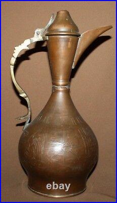 Antique hand made Islamic engraved copper pitcher with spout coffee tea pot