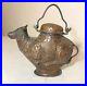 Antique handmade tooled Middle Eastern copper bull shaped holy water kettle pot