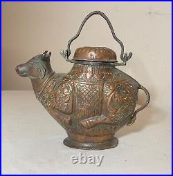 Antique handmade tooled Middle Eastern copper bull shaped holy water kettle pot