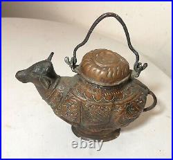 Antique handmade tooled Middle Eastern copper bull shaped holy water kettle pot