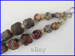 Islamic glass trade beads 28 large, 6 small, plus spacers. PROVENANCE