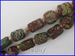 Islamic glass trade beads 28 large, 6 small, plus spacers. PROVENANCE