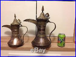 Pair of Islamic Dallah coffee pots copper and brass very old
