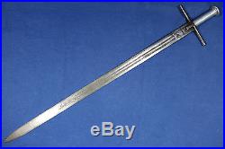 Sudanese Kaskara sword with beautiful engraved blade Sudan Early 20th