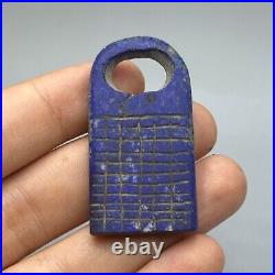 Unique ancient near eastern lapis amulet with stripes carved