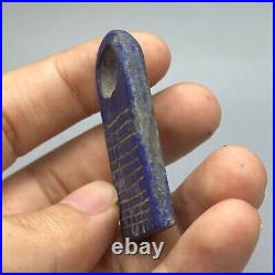 Unique ancient near eastern lapis amulet with stripes carved